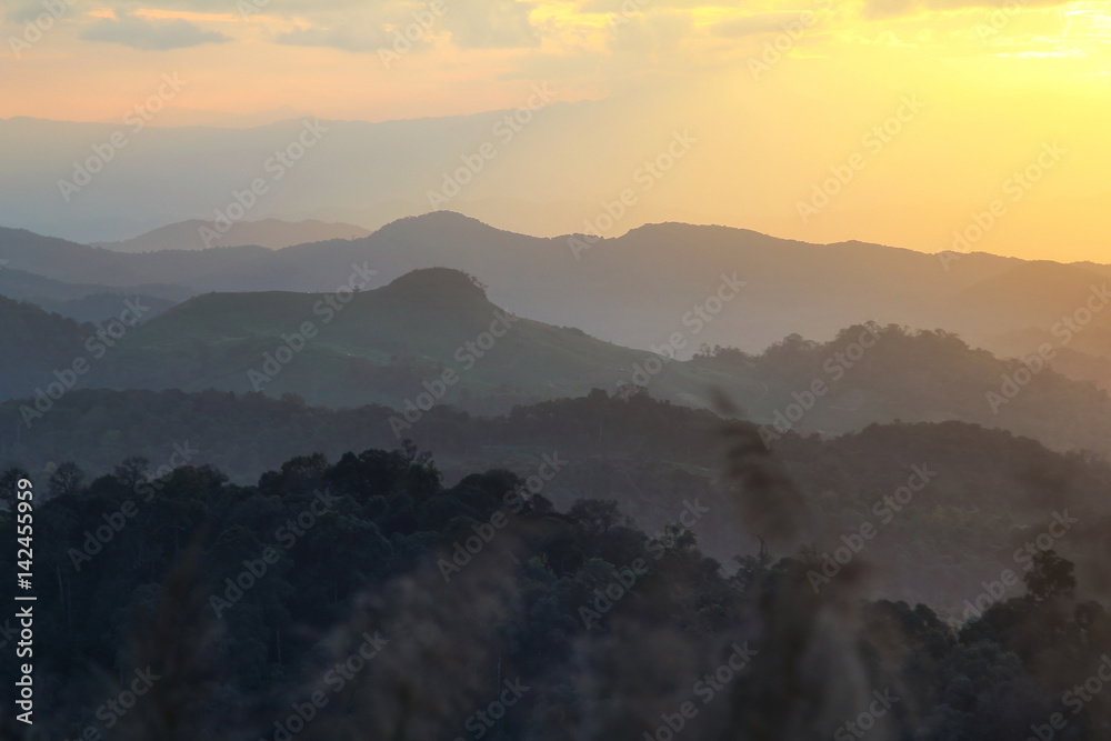 Beautiful scenery during time the sunset and cordillera alternating layers of Doi Pha Phung at Nan province,Thailand is a very popular for photographers and tourists. Attractions and natural Concept Beautiful scenery during time the sunset and cordillera alternating layers of Doi Pha Phung at Nan province,Thailand is a very popular for photographers and tourists. Attractions and natural Concept