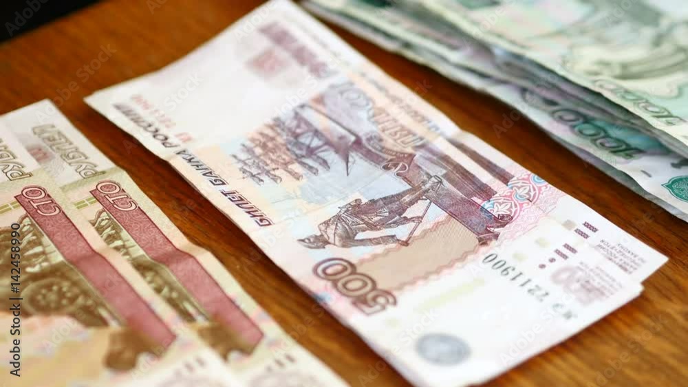 Man Counting Rubles. Russian Banknotes. Sunny Day. Man Counting Rubles. Russian Banknotes. Sunny Day.