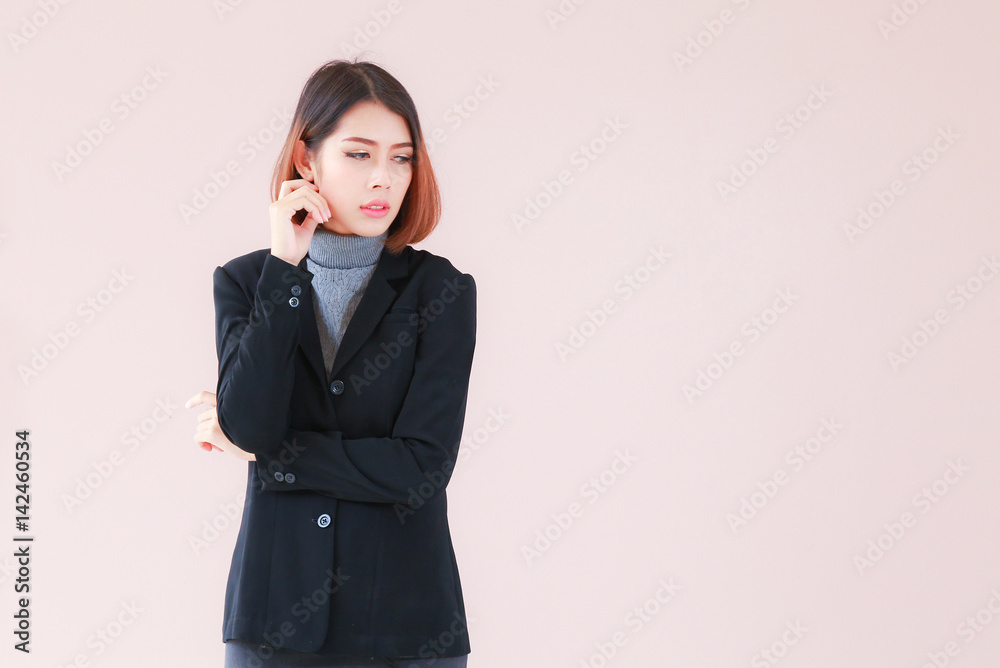 Modern business women confident pose with space pink background, Business woman standing, Asian people young beautiful businesswoman smile and wear shirt black suit. space pink background for texture