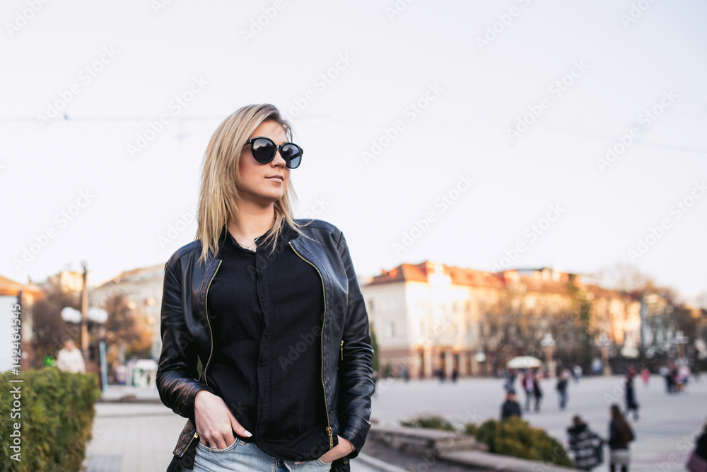 Fototapeta premium beautiful girl posing, professional model works, city walk