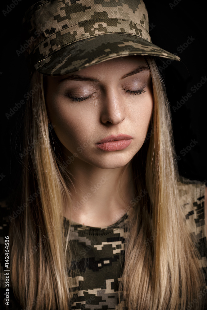 portrait of beautiful woman soldiers in military attire on black background portrait of beautiful woman soldiers in military attire on black background