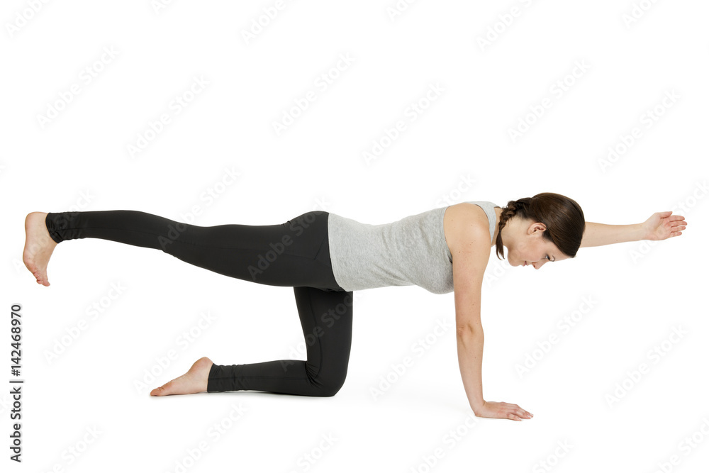 Yoga woman grey Position Vyaghrasana Yoga woman grey Position Vyaghrasana