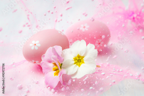 Pink Easter egg and two flowers
