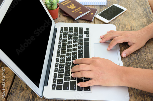 A female hands working with laptop