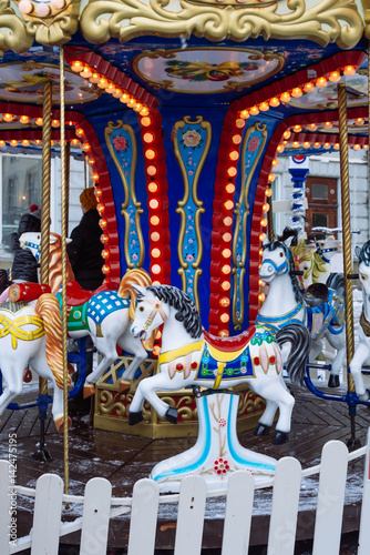 children's fun colorful carousel with horses