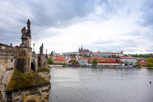 Old Town ancient architecture and river pier in Prague, Czech Republic