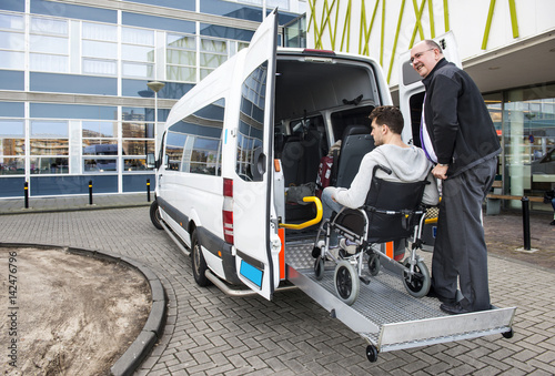 Fotobehang Wheelchair taxi pick up