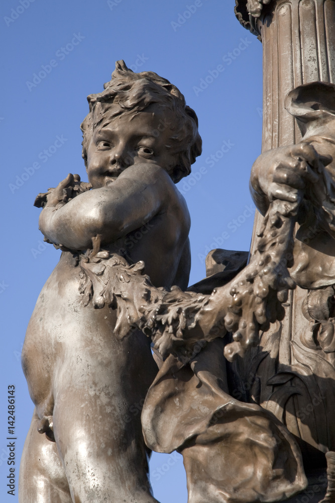 Figure on Pont Alexandre III Bridge in Paris, France