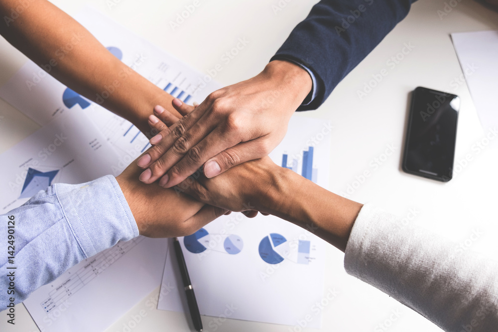 Image of business, Concept of Teamwork people joining hands.