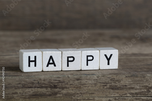 Happy, written in cubes