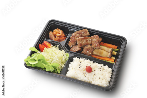 Isolated and clipping path of Beef steak set in bento box set.
