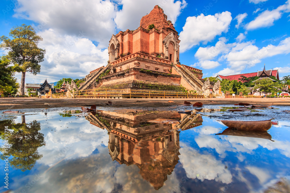 Naklejka premium Ancient pagoda at Wat Chedi Luang in Chiangmai province of Thailand. They are public domain or treasure of Buddhism, no restrict in copy or use.