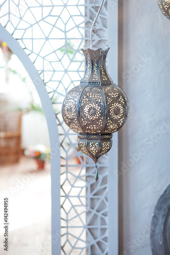 Selective focus point on Morocco light lantern decoration in living room interior - Vintage Light Filter