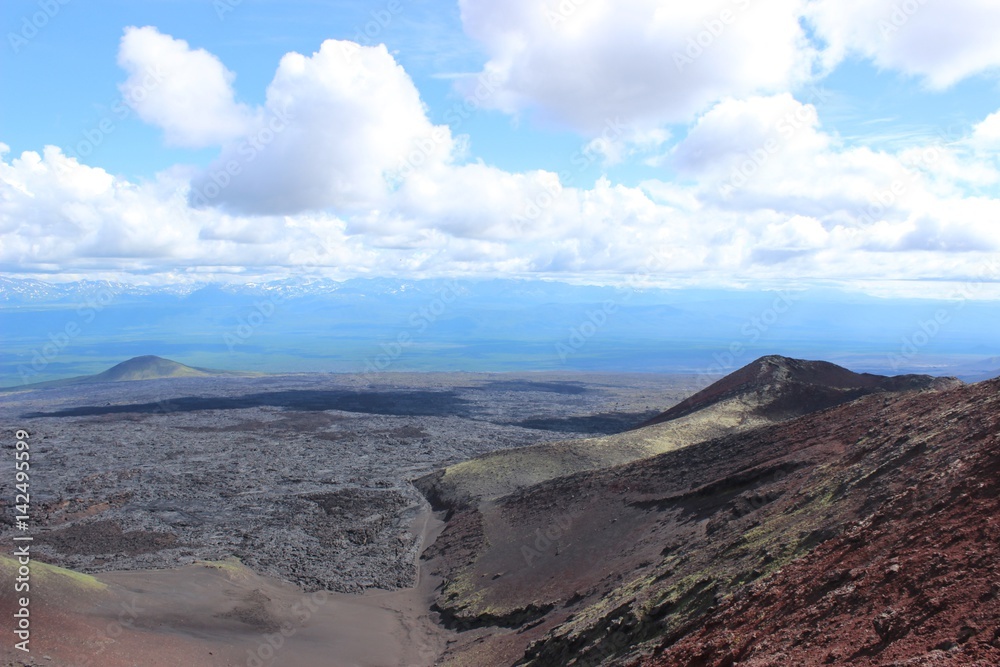Fototapeta premium Black and red ash, valley of hills, after volcanic eruption