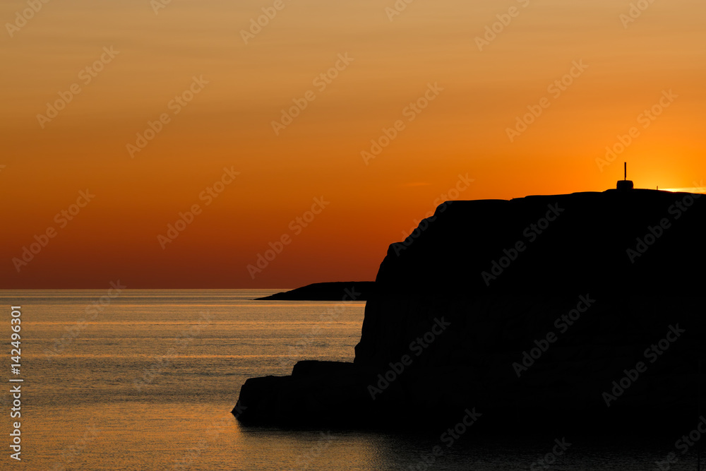 Orange sunset over the Bohus archipelago in Sweden