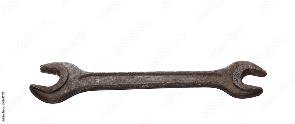 old rusty wrench isolated on white