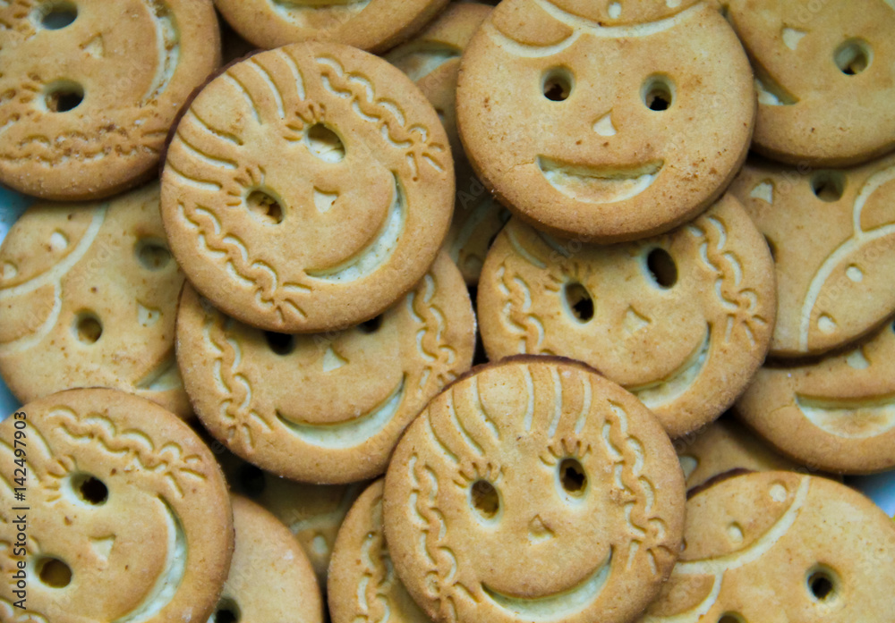 Background of round smiling cookies