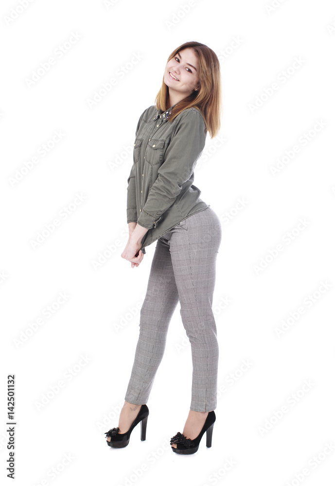 Young beautiful blonde woman in gray trousers Young beautiful blonde woman in gray trousers