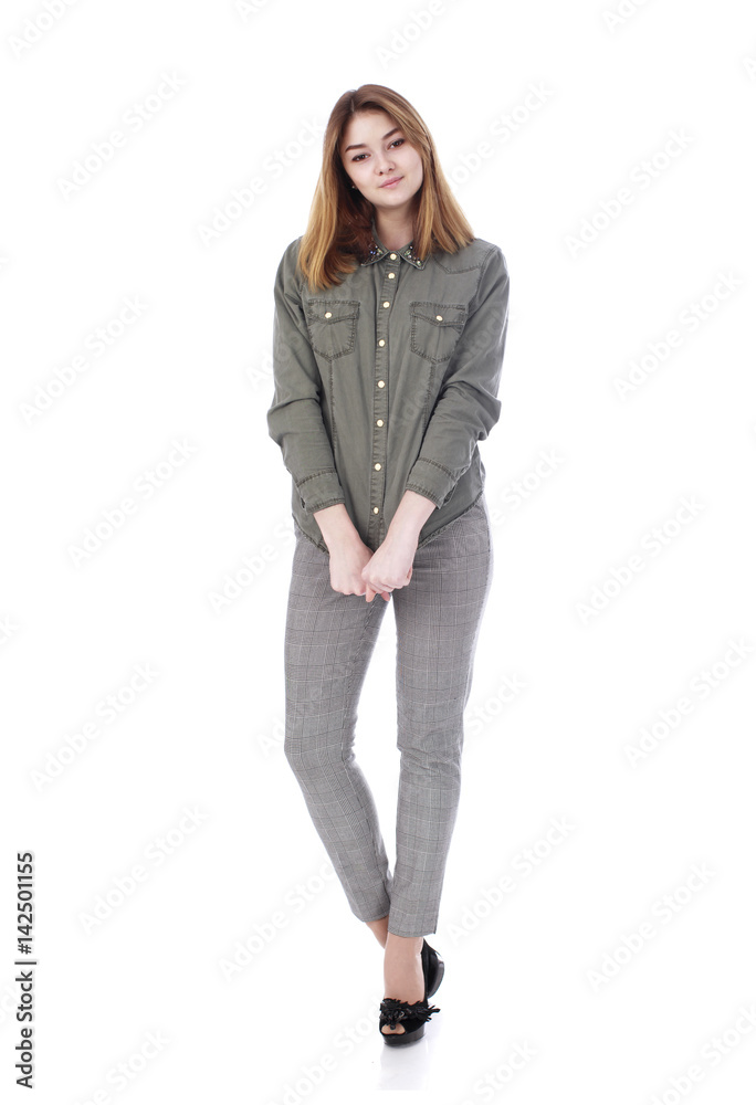 Young beautiful blonde woman in gray trousers Young beautiful blonde woman in gray trousers