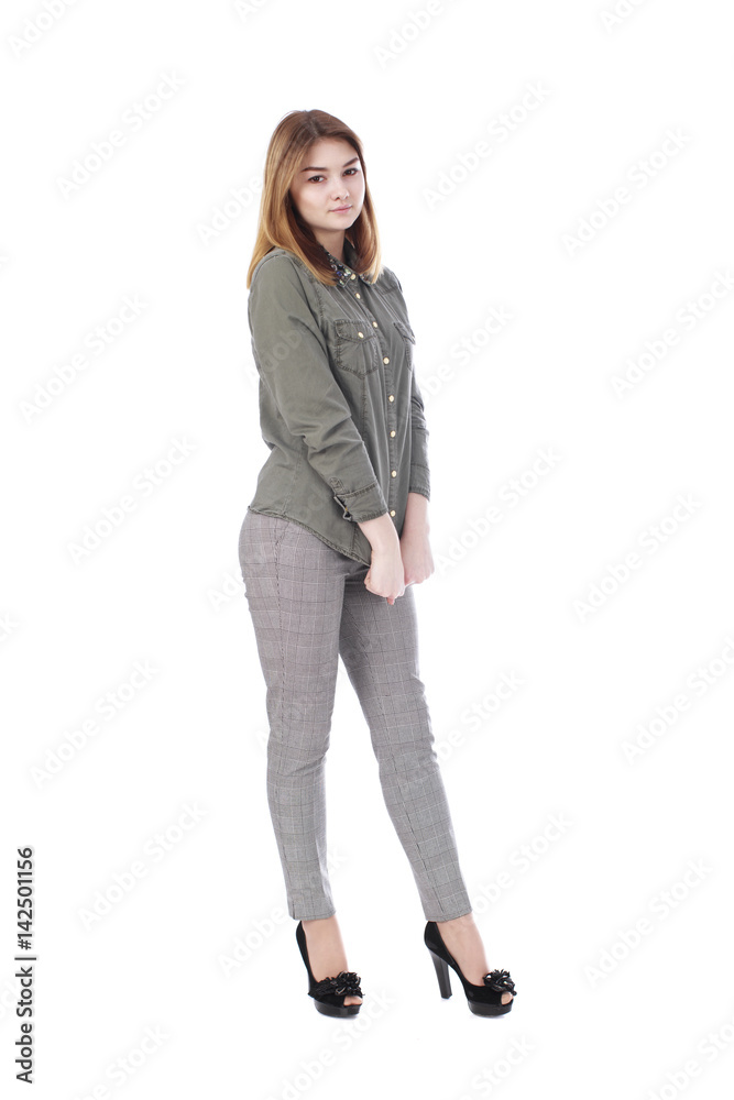 Young beautiful blonde woman in gray trousers Young beautiful blonde woman in gray trousers