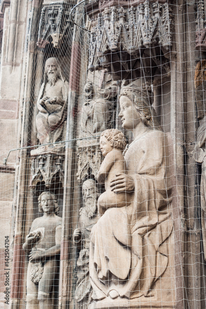 Saint Mother Mary and Baby Jesus, portal of Frauenkirche in Nuremberg, Germany
