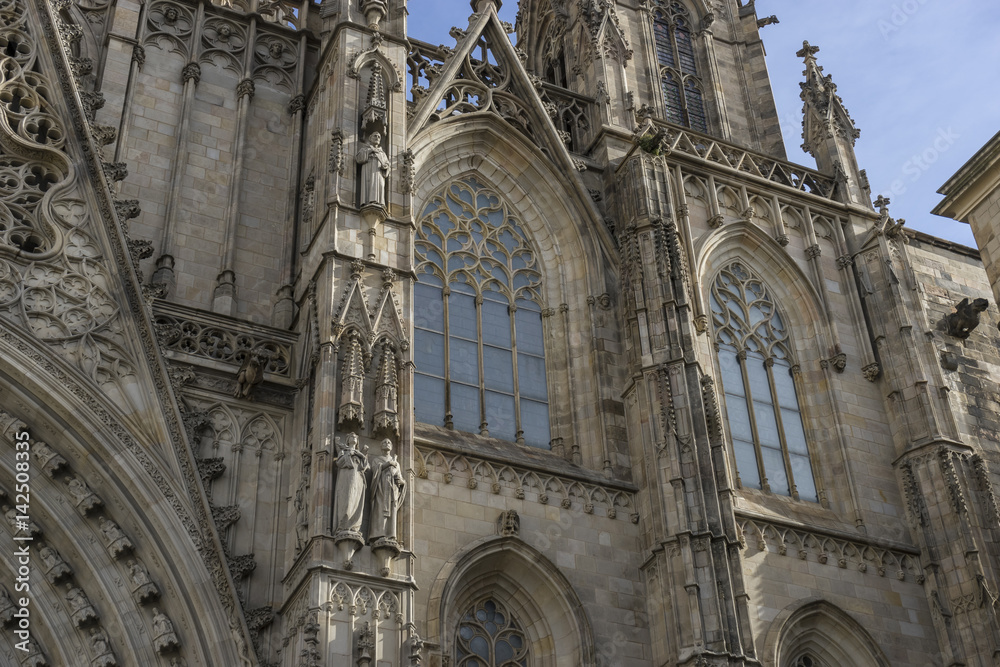 Obraz premium Facade of the Cathedral of Barcelona located in the old part of the city, catalonia, spain