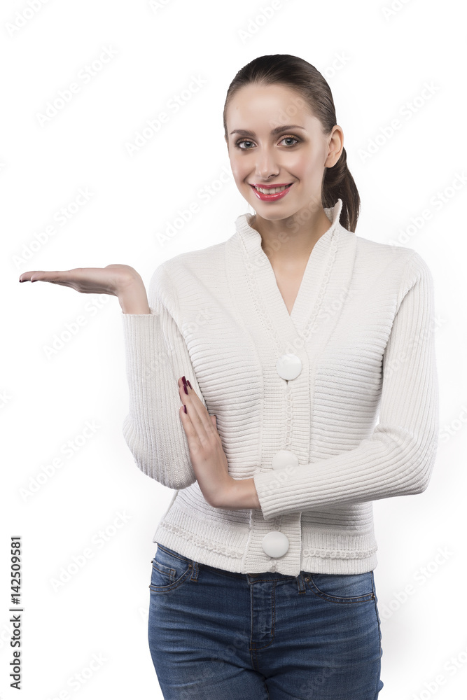 girl in pullover holds something isolated on white girl in pullover holds something isolated on white