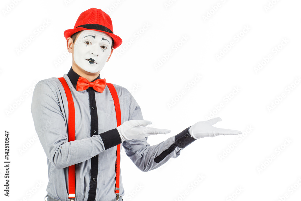 Portrait of a man, artist,clown, MIME. Shows something, isolated on white background Portrait of a man, artist,clown, MIME. Shows something, isolated on white background