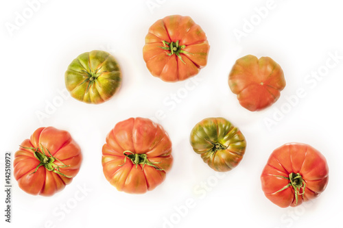 Overhead photo of Spanish Raf tomatoes on white