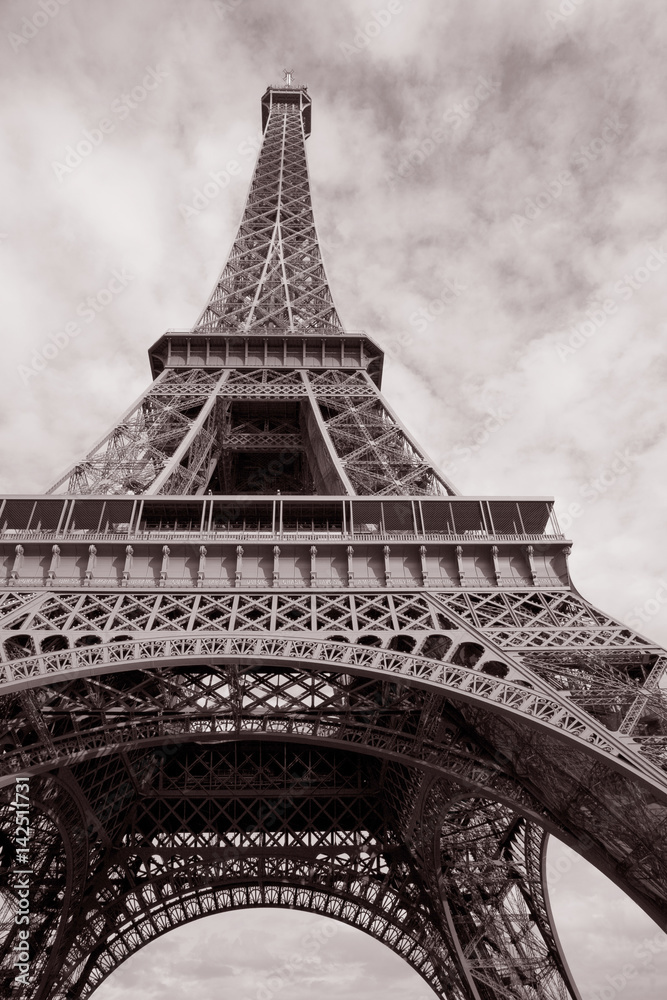 Eiffel Tower in Black and White Sepia Tone with Heart Shape in Clouded Sky in Paris, France