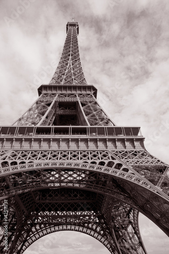 Eiffel Tower in Black and White Sepia Tone with Heart Shape in Clouded Sky in Paris, France © kevers