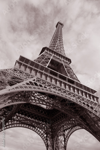 Eiffel Tower in Black and White Sepia Tone against clouded sky; Paris; France