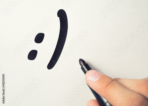 The smilie is drawn on a piece of paper