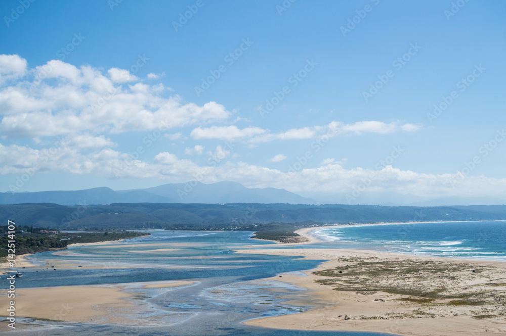Beach and Coastline with Inlet and Houses Seen from a Lookout at Plettenberg Bay in South Africa Beach and Coastline with Inlet and Houses Seen from a Lookout at Plettenberg Bay in South Africa