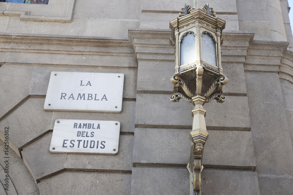 The Rambla Street Sign with Lamp in Barcelona, Catalonia, Spain The Rambla Street Sign with Lamp in Barcelona, Catalonia, Spain