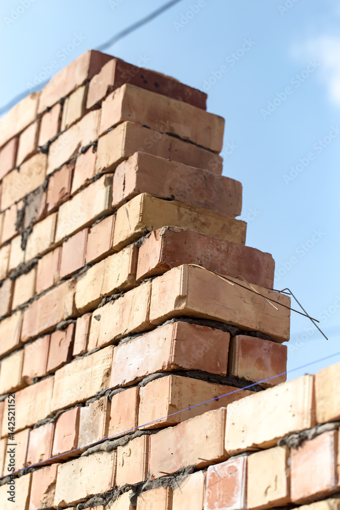 Brick wall on a construction site as a background Brick wall on a construction site as a background