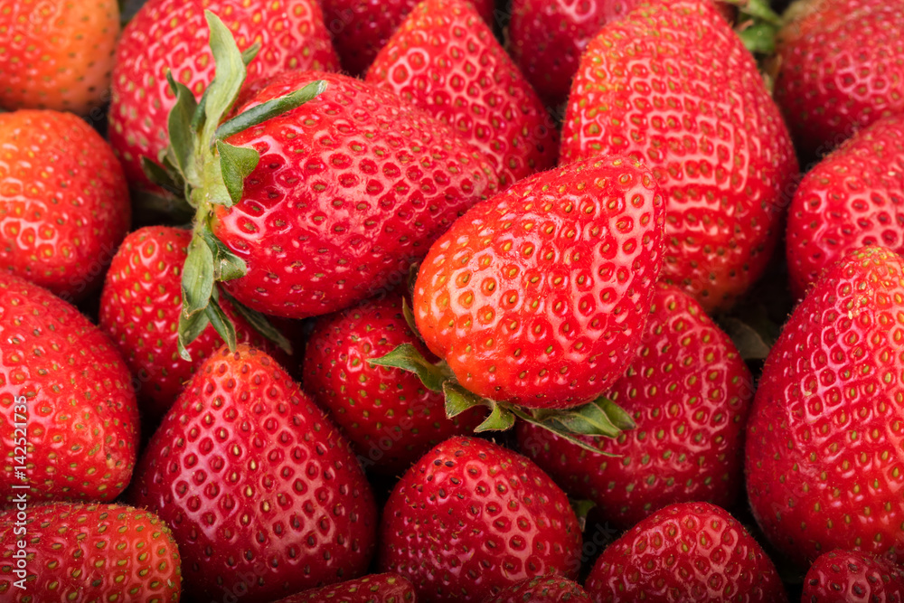 Strawberry background. Ripe strawberies closeup Strawberry background. Ripe strawberies closeup