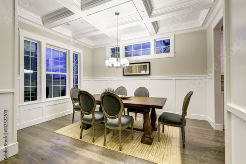 Lovely craftsman style dining room with coffered cealing photo