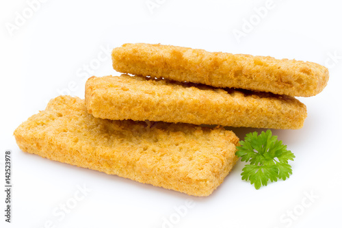 Fish fingers on the white background.