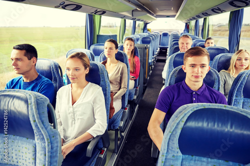 group of passengers or tourists in travel bus