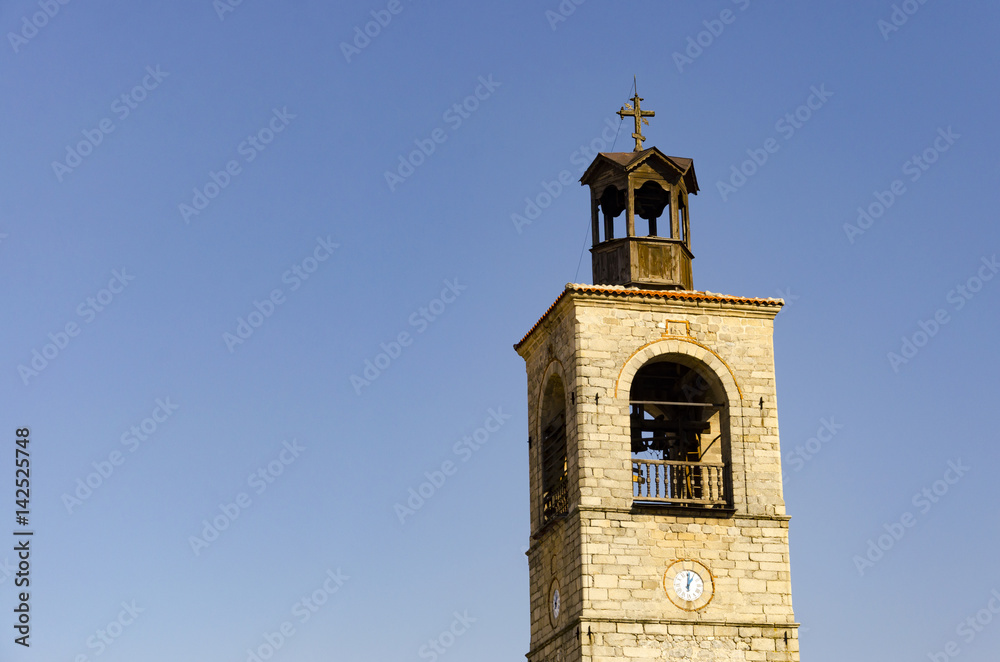 Bell tower of Bulgarian National Revival-style Church of the Holy Trinity in Bansko