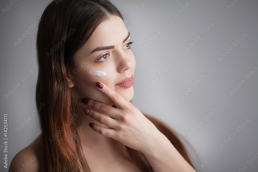 Portrait of beautiful smiling Asian woman with elegant hairstyle and perfect soft makeup. Skin care Cosmetics concept. Freckles face. High resolution,studio shot, Portrait of beautiful smiling Asian woman with elegant hairstyle and perfect soft makeup. Skin care Cosmetics concept. Freckles face. High resolution,studio shot,