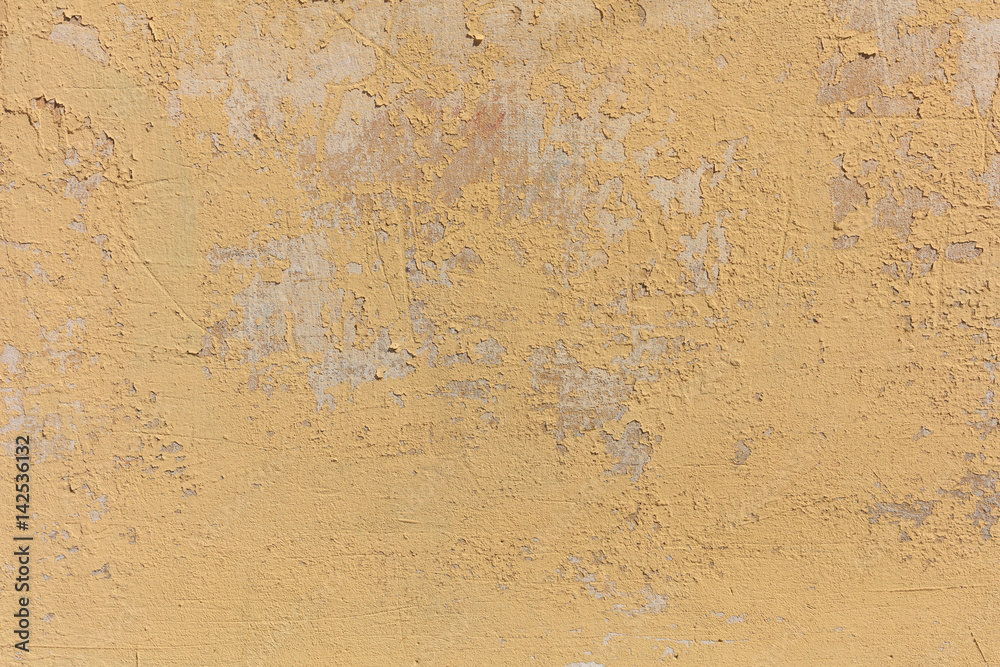 Obraz premium Worn pale yellow wall background