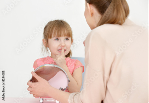 Cute little girl at speech ...