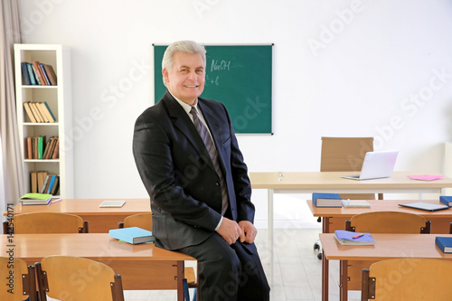 Portrait of senior teacher ...