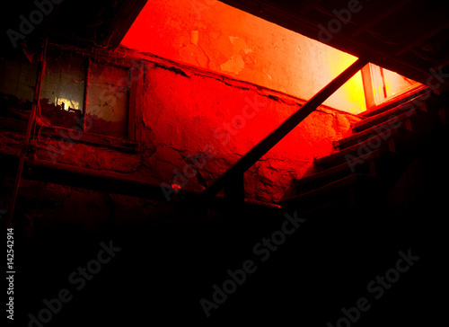 Basement stairs with a red light