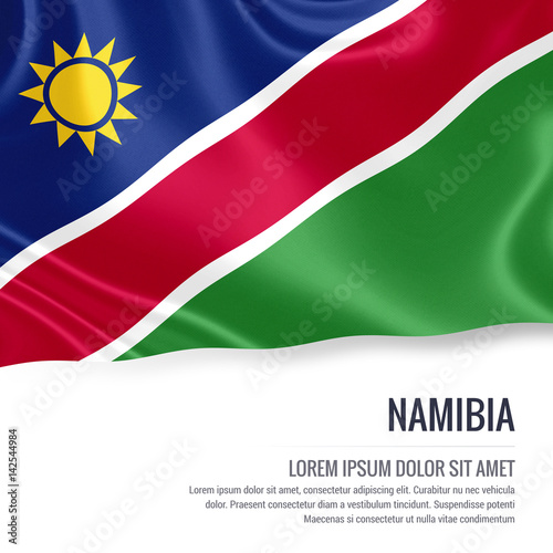 Free Download Silky flag of Namibia waving on an isolated white background with the white text area for your advert message. 3D rendering. - GFXLoad