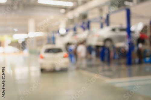 car repair service center blurred background