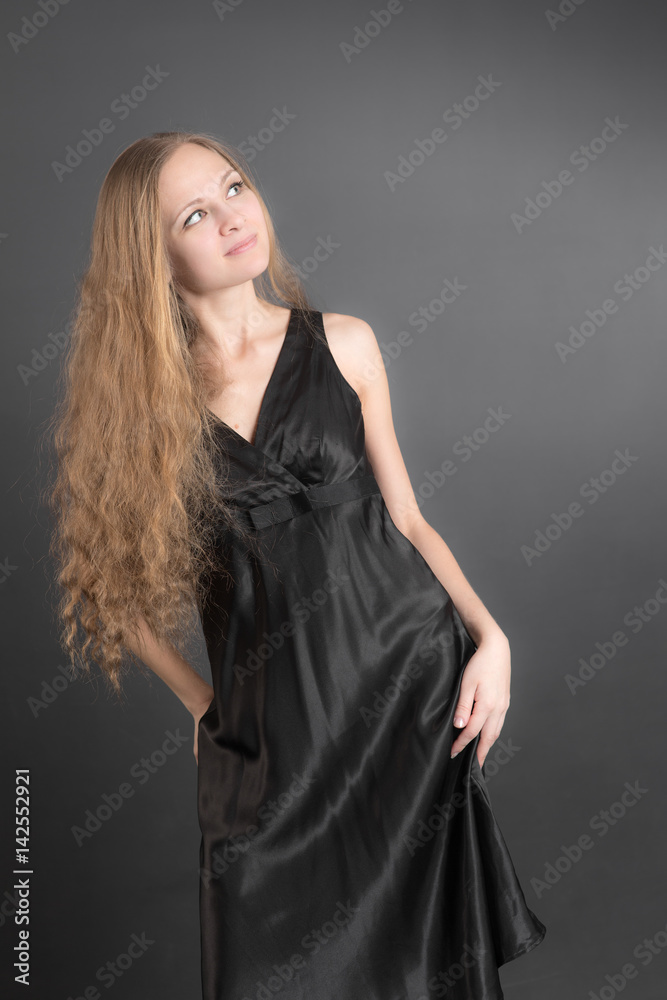 Portrait of a girl in a black dress