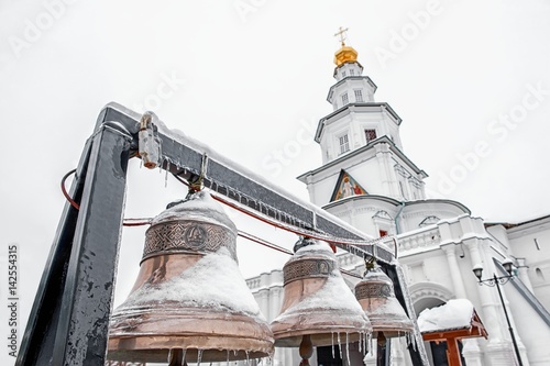 New Jerusalem monastery, Istra, Russia, the bells and the bell tower horizontally in winter in cloudy weather